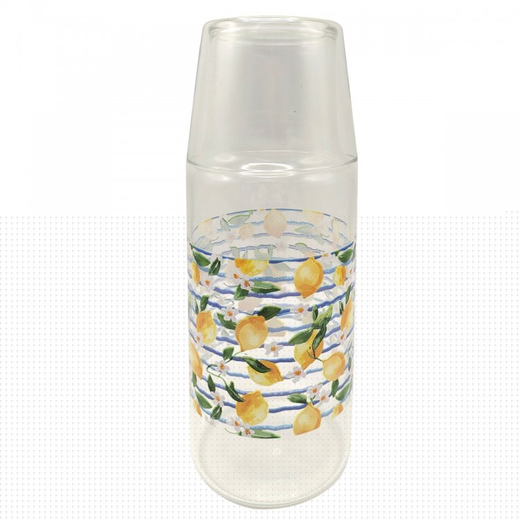 Jarra y vaso limones