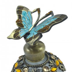 Botella de perfume mariposa