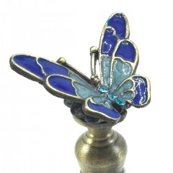 Botella de perfume mariposa