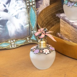 Botella de perfume lazo