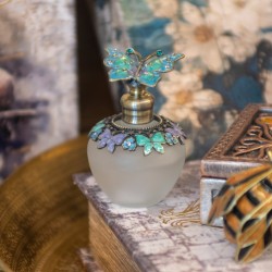 Botella de perfume mariposa